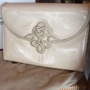 Fragiacomo Italian made leather  ivory Clutch.